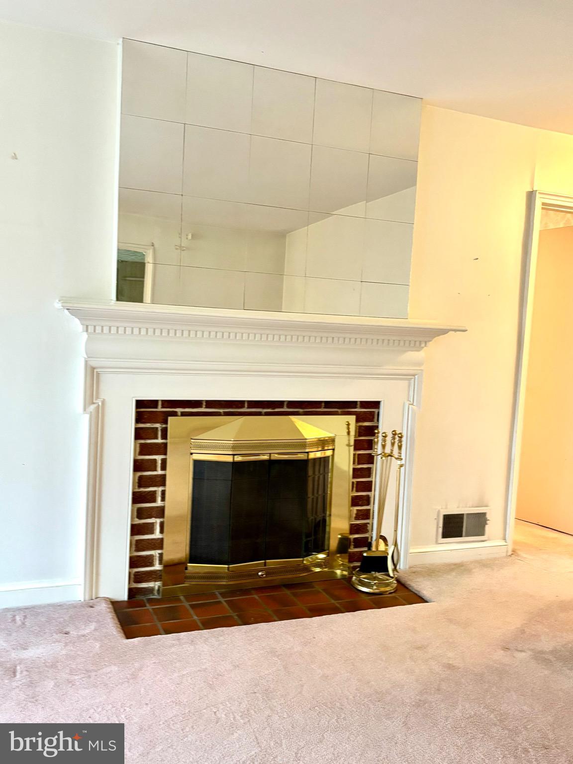 9815 Cottrell Terrace Silver Spring, MD 20903 - Photo 12 of 28 a living room with a fireplace