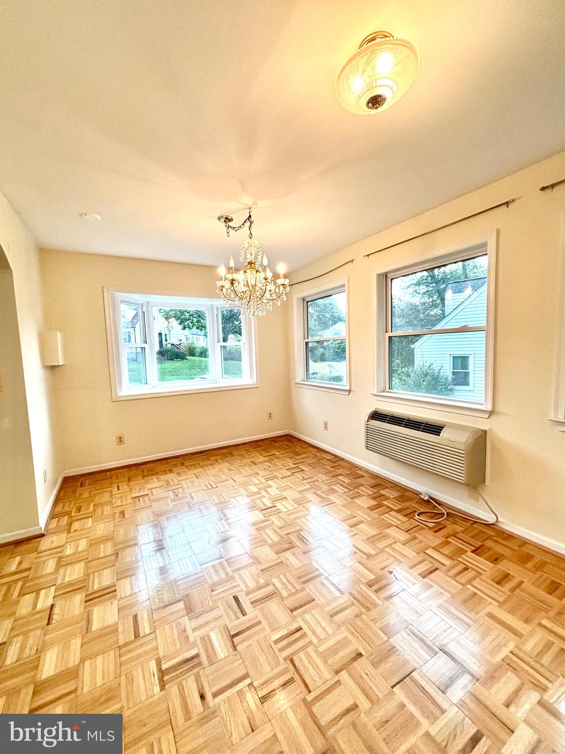 9815 Cottrell Terrace Silver Spring, MD 20903 - Photo 16 of 28 a view of a room with window and wooden floor