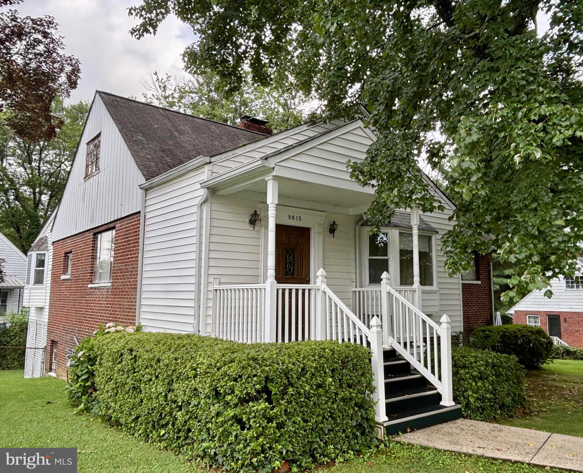 9815 Cottrell Terrace Silver Spring, MD 20903 - Photo 2 of 28 a view of a house with a yard