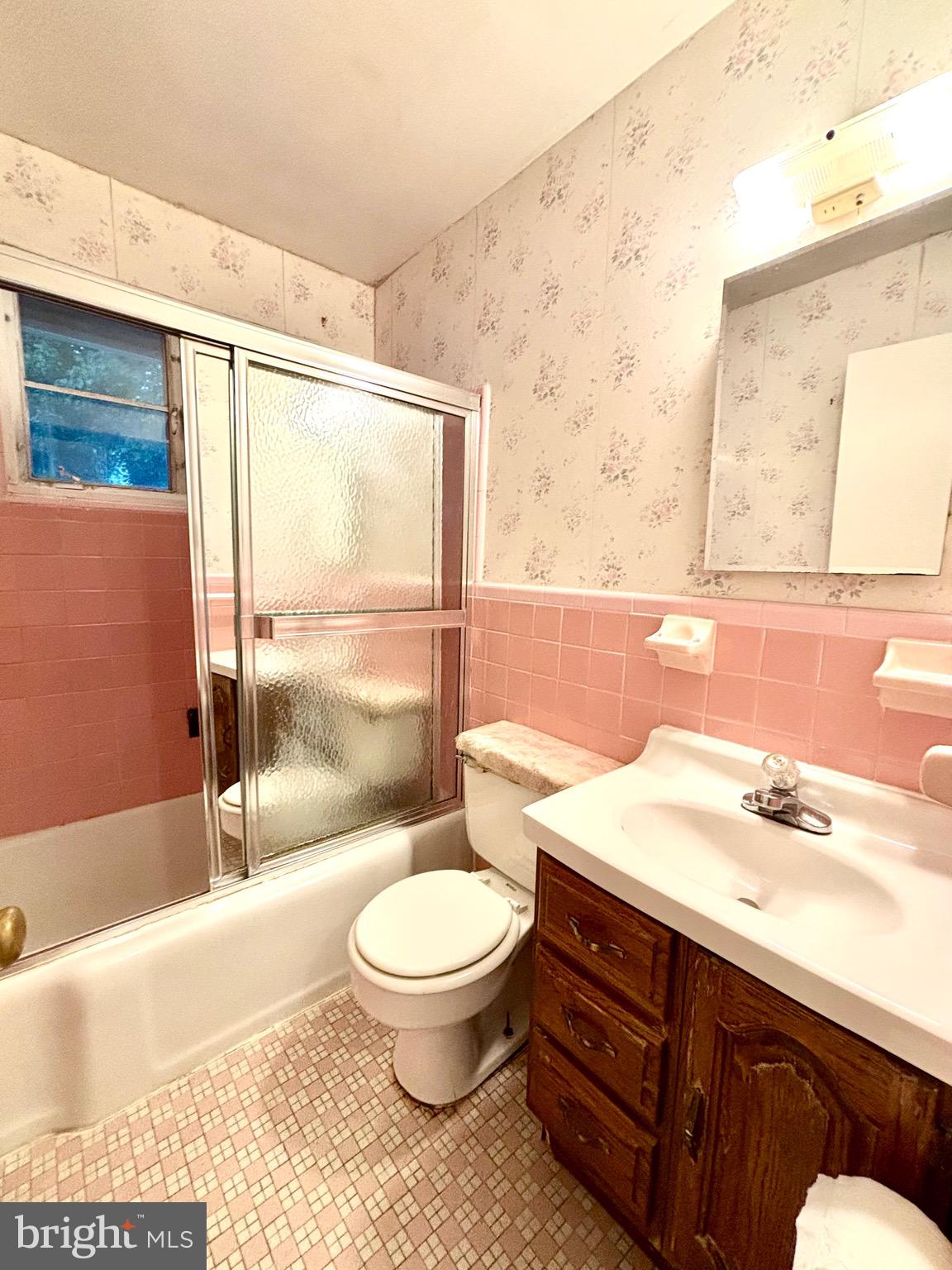 9815 Cottrell Terrace Silver Spring, MD 20903 - Photo 21 of 28 a bathroom with a sink toilet and shower