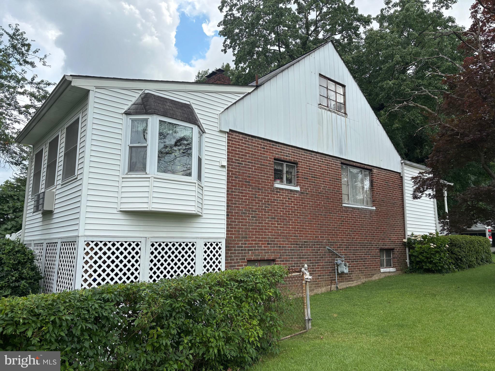 9815 Cottrell Terrace Silver Spring, MD 20903 - Photo 5 of 28 a view of a house with a yard