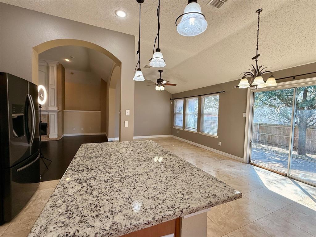 2607 Ridgeoak Trail Mansfield, TX 76063 - Photo 17 of 32 a spacious bathroom with a granite countertop sink a mirror and shower