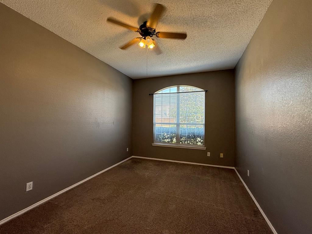 2607 Ridgeoak Trail Mansfield, TX 76063 - Photo 24 of 32 an empty room with a window