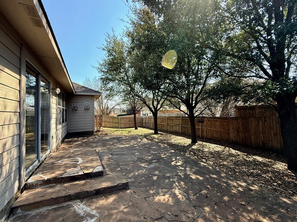 2607 Ridgeoak Trail Mansfield, TX 76063 - Photo 32 of 32 a view of a backyard of a house
