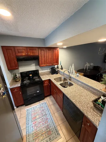 a view of a chairs and table in a room