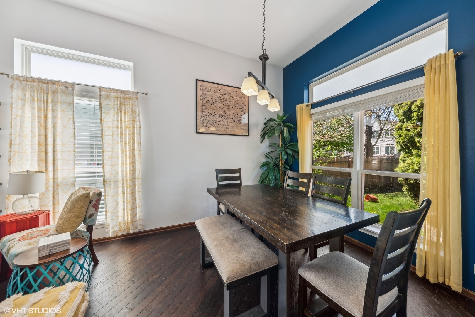 7445 Inglenook Lane Gurnee, IL 60031 - Photo 4 of 26 a view of a dining room with furniture window and wooden floor