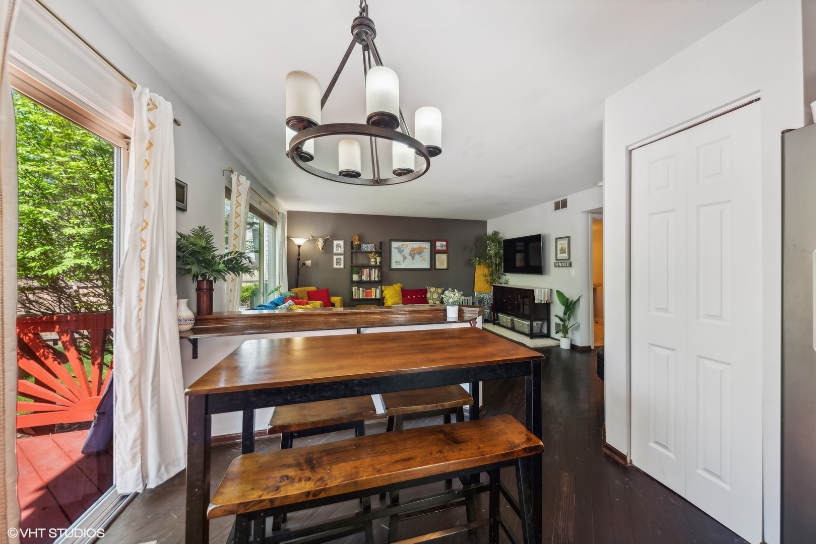 7445 Inglenook Lane Gurnee, IL 60031 - Photo 8 of 26 a room with chandelier fan and wooden floor