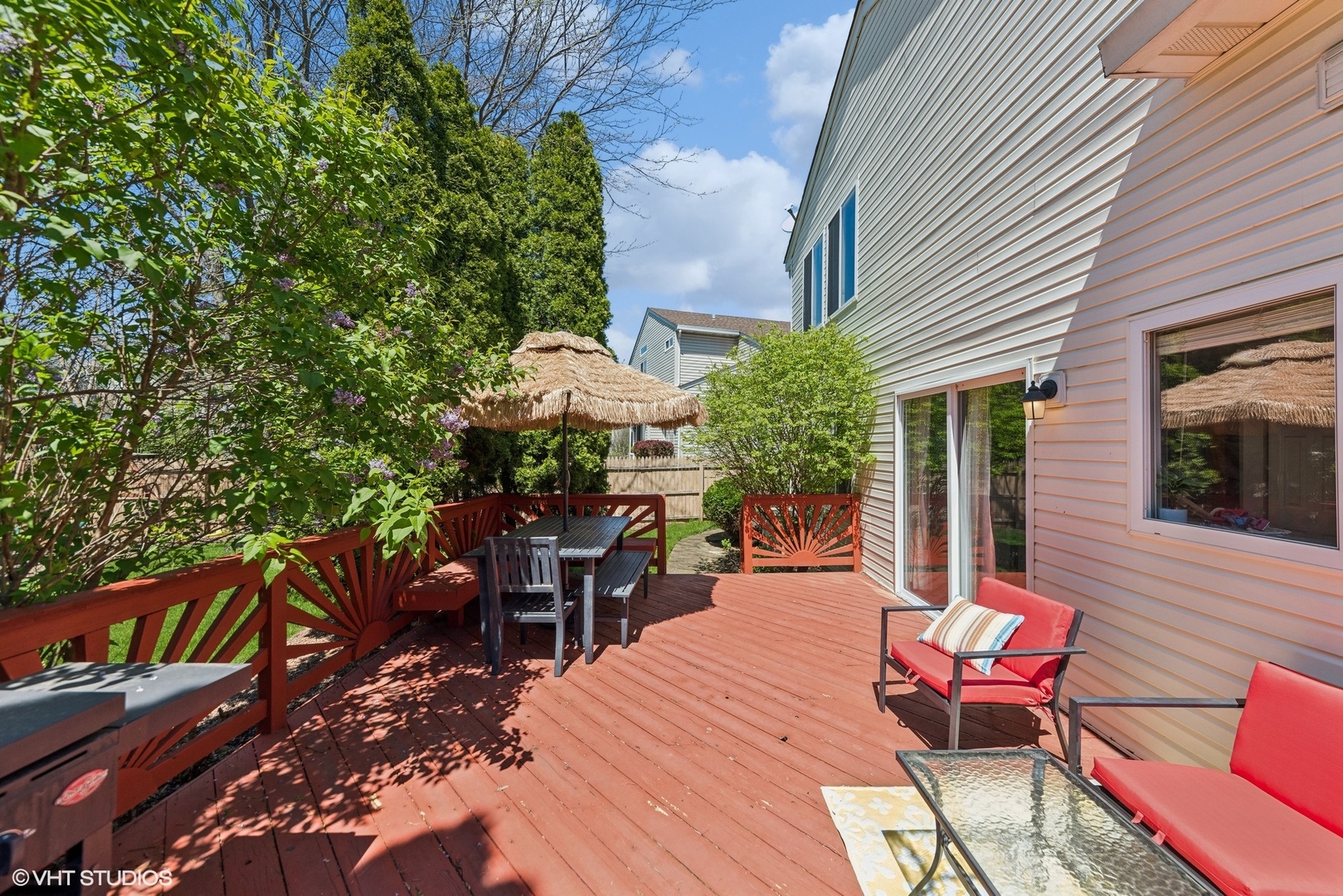 7445 Inglenook Lane Gurnee, IL 60031 - Photo 10 of 26 a backyard of a house with wooden floor outdoor seating and yard in the back