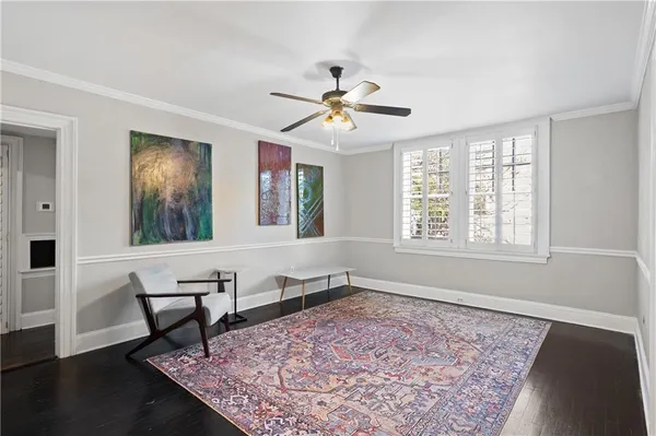 a living room with a rug