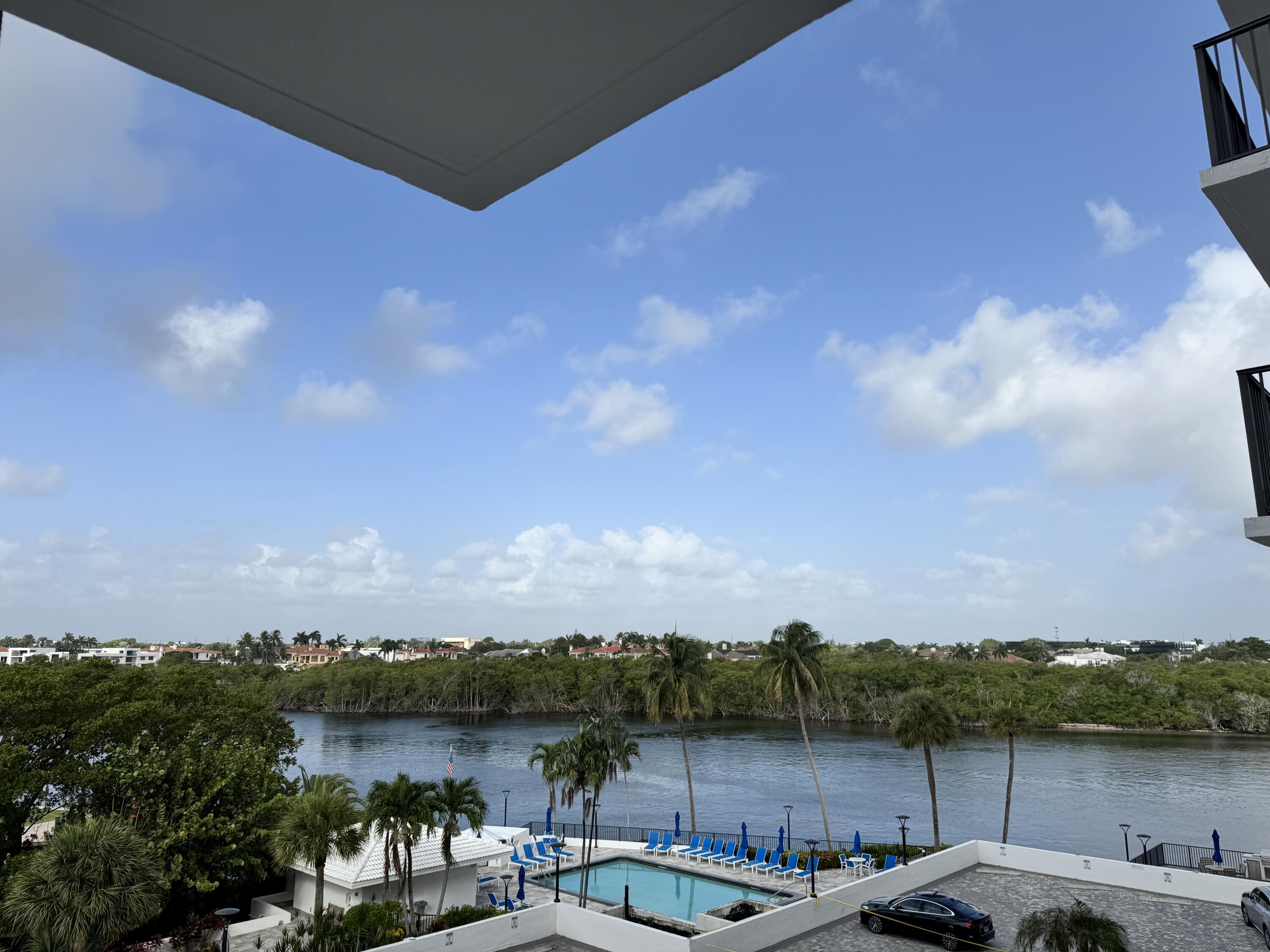 4750 South Ocean Boulevard, Unit 409 Highland Beach, FL 33487 - Photo 2 of 26 a view of a lake