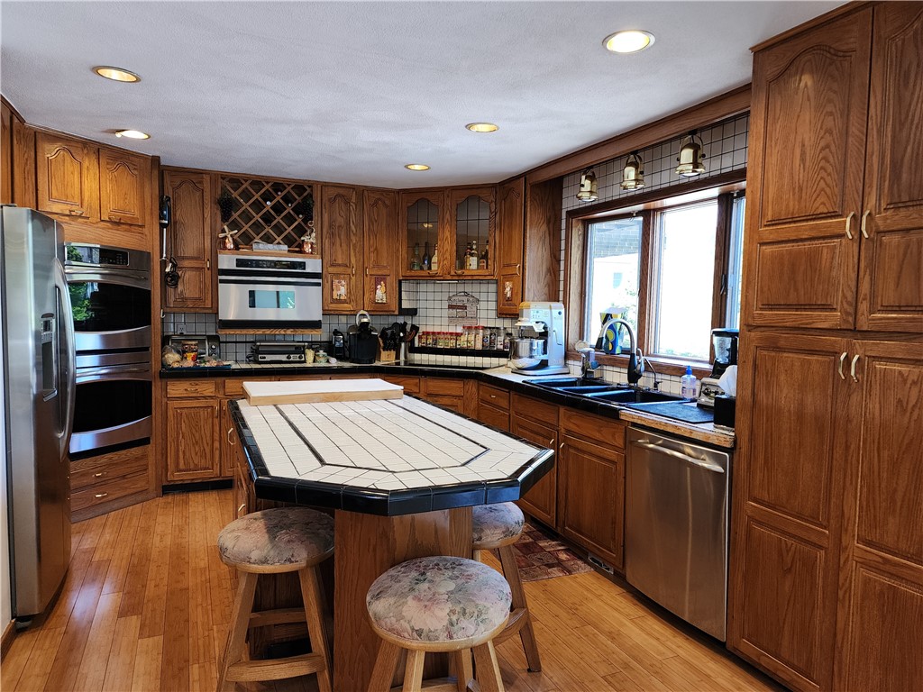 304 Carpenter Road Scituate, RI 02831 - Photo 14 of 42 Huge Island, custom cabinetry, new appliances!