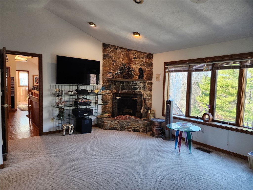 304 Carpenter Road Scituate, RI 02831 - Photo 22 of 42 Master bedroom has fireplace, vaulted ceilings, spa & private bath, french doors to huge balcony
