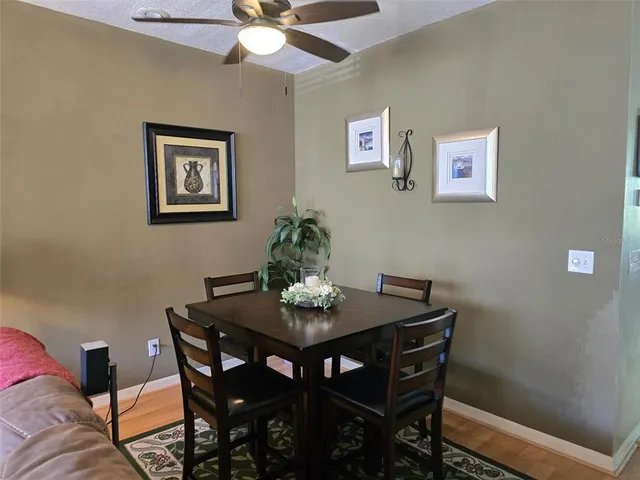 a view of a dining room with furniture