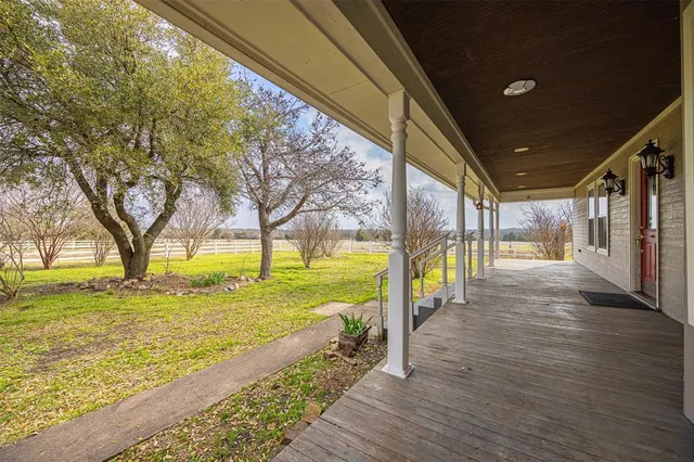 a view of an ocean with a swimming pool