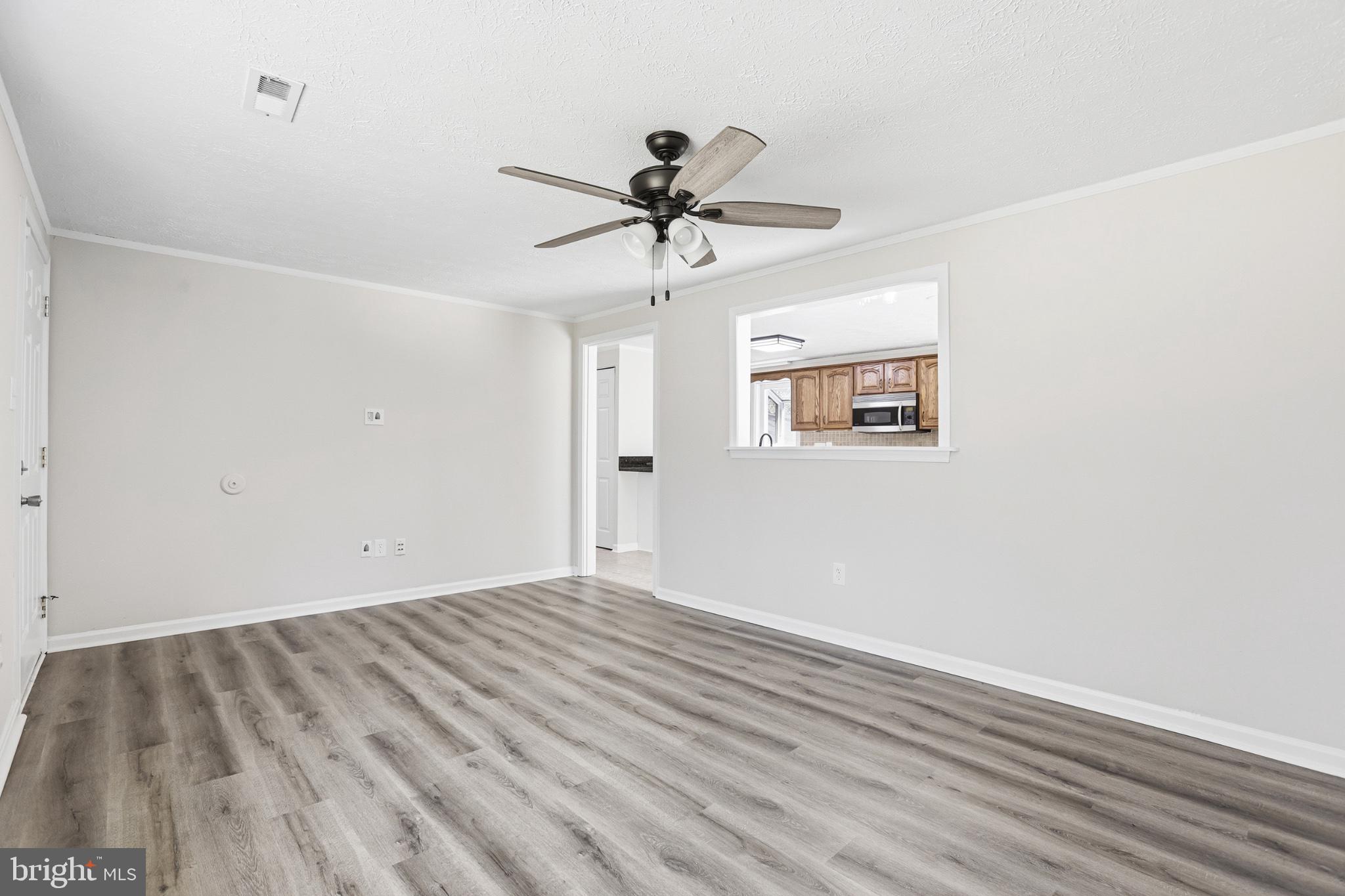 7012 Stanley Road King George, VA 22485 - Photo 8 of 37 Bright and airy living space awaits!