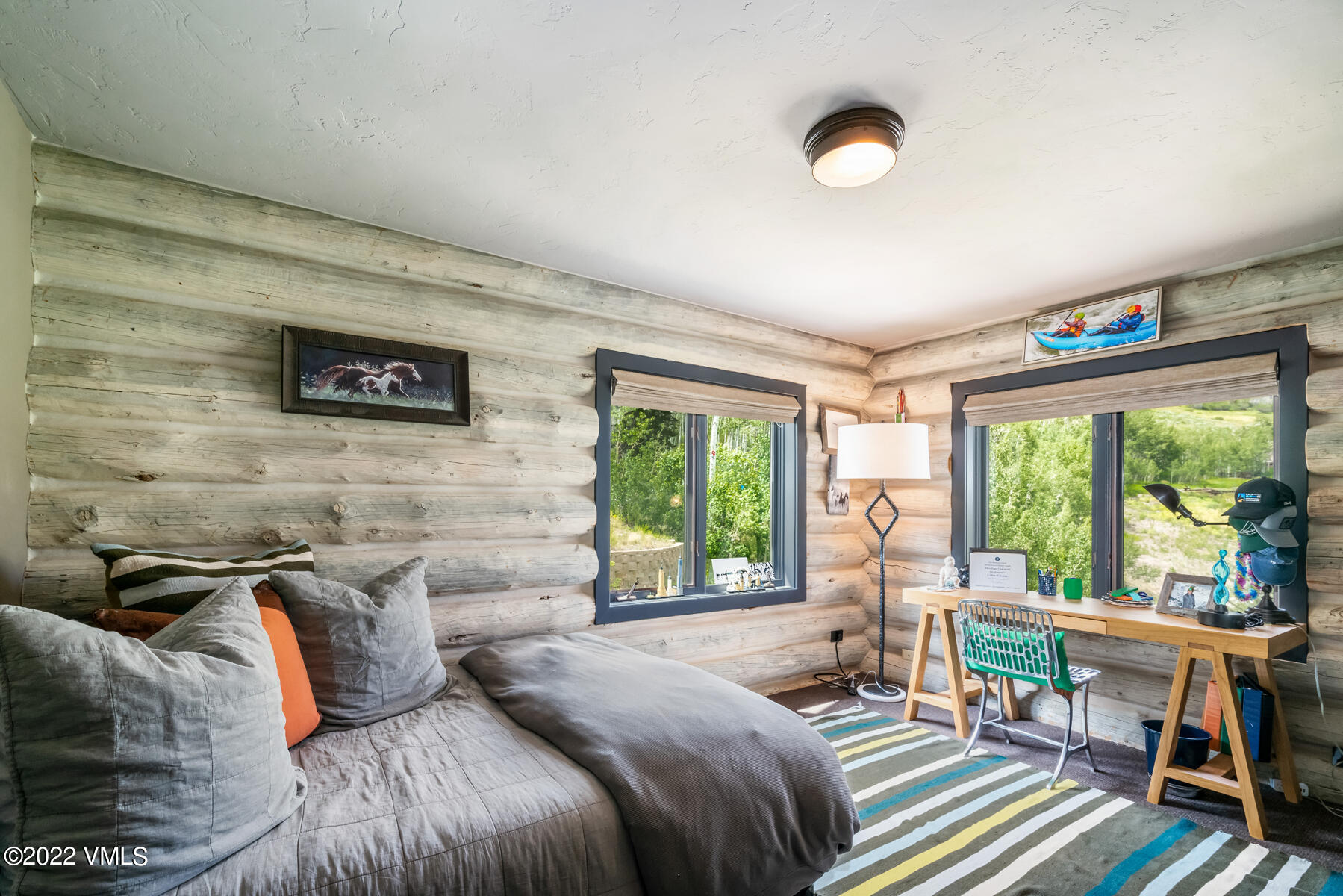 1145 Pilgrim Drive Edwards, CO 81632 - Photo 31 of 54 a bedroom with a bed and a large window