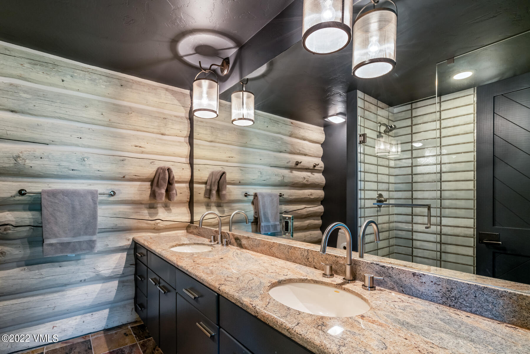 1145 Pilgrim Drive Edwards, CO 81632 - Photo 32 of 54 a bathroom with a sink and a mirror