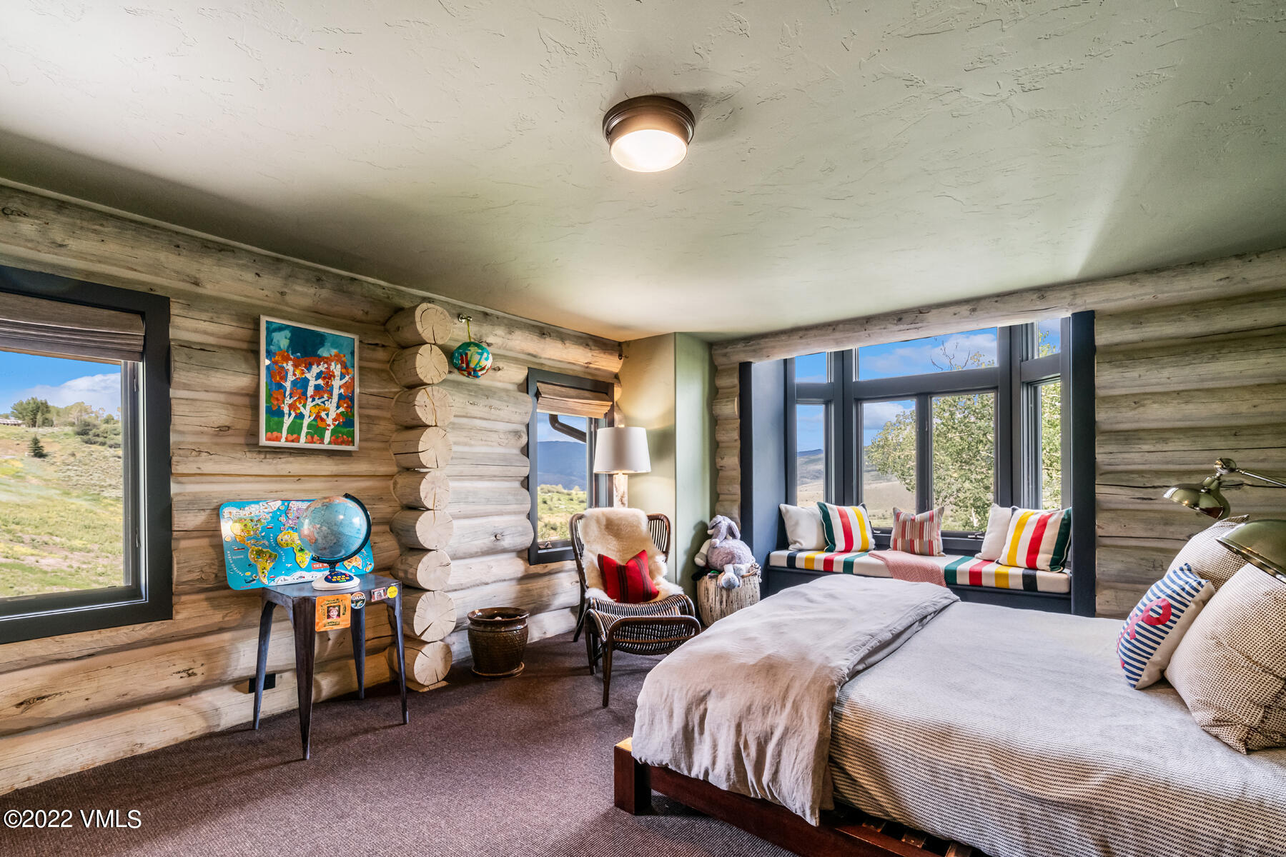 1145 Pilgrim Drive Edwards, CO 81632 - Photo 33 of 54 a bedroom with bed and a large window