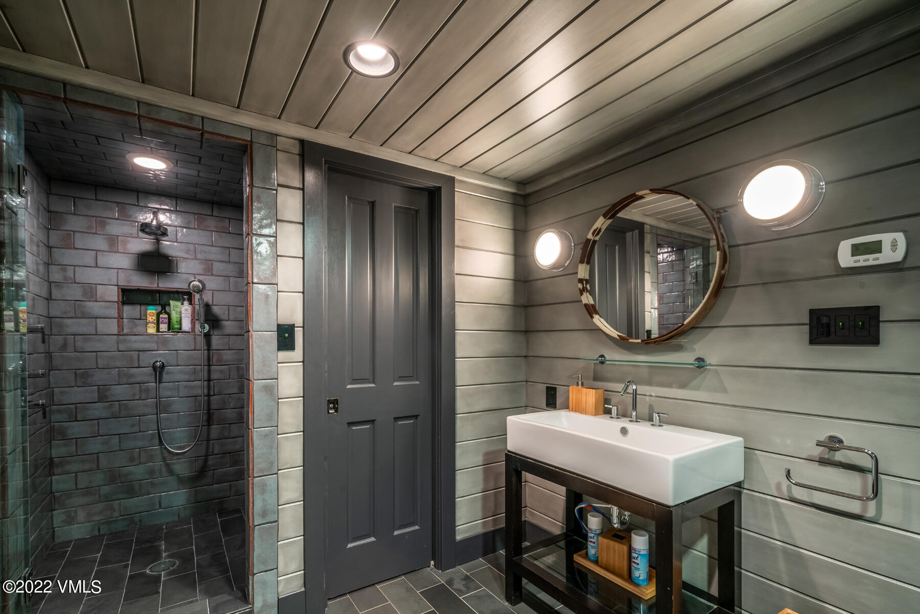 1145 Pilgrim Drive Edwards, CO 81632 - Photo 37 of 54 a bathroom with a sink shower and a mirror