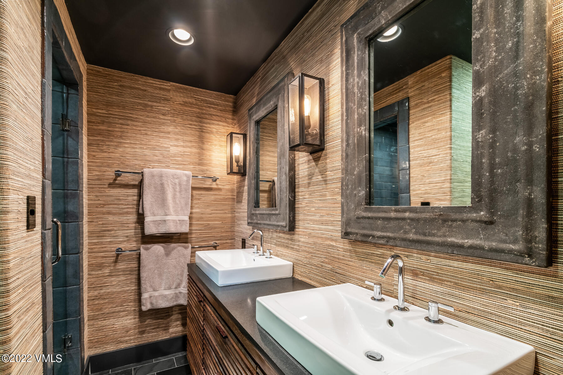 1145 Pilgrim Drive Edwards, CO 81632 - Photo 39 of 54 a bathroom with double vanity sink and a mirror