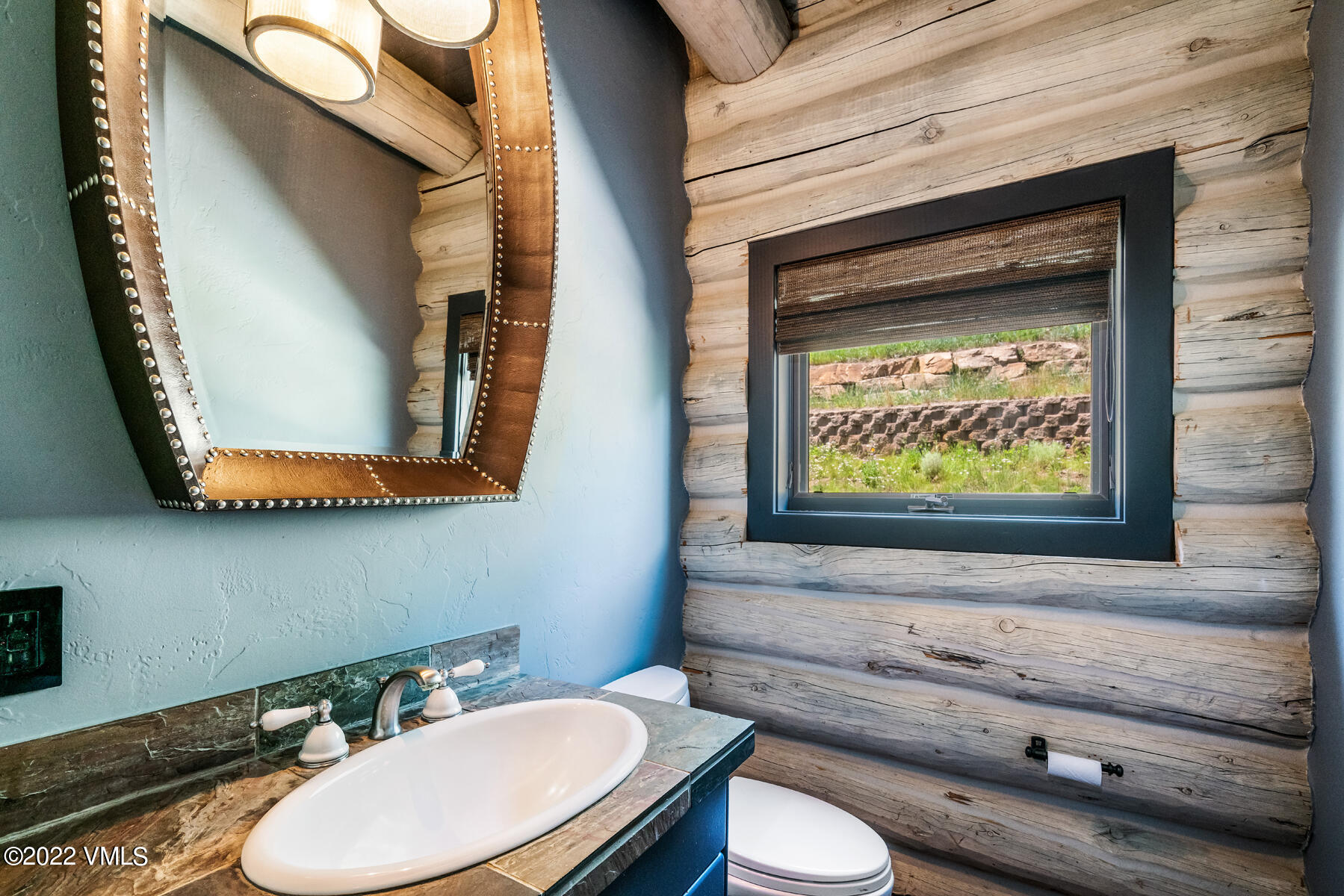 1145 Pilgrim Drive Edwards, CO 81632 - Photo 42 of 54 a bathroom with a toilet sink and mirror