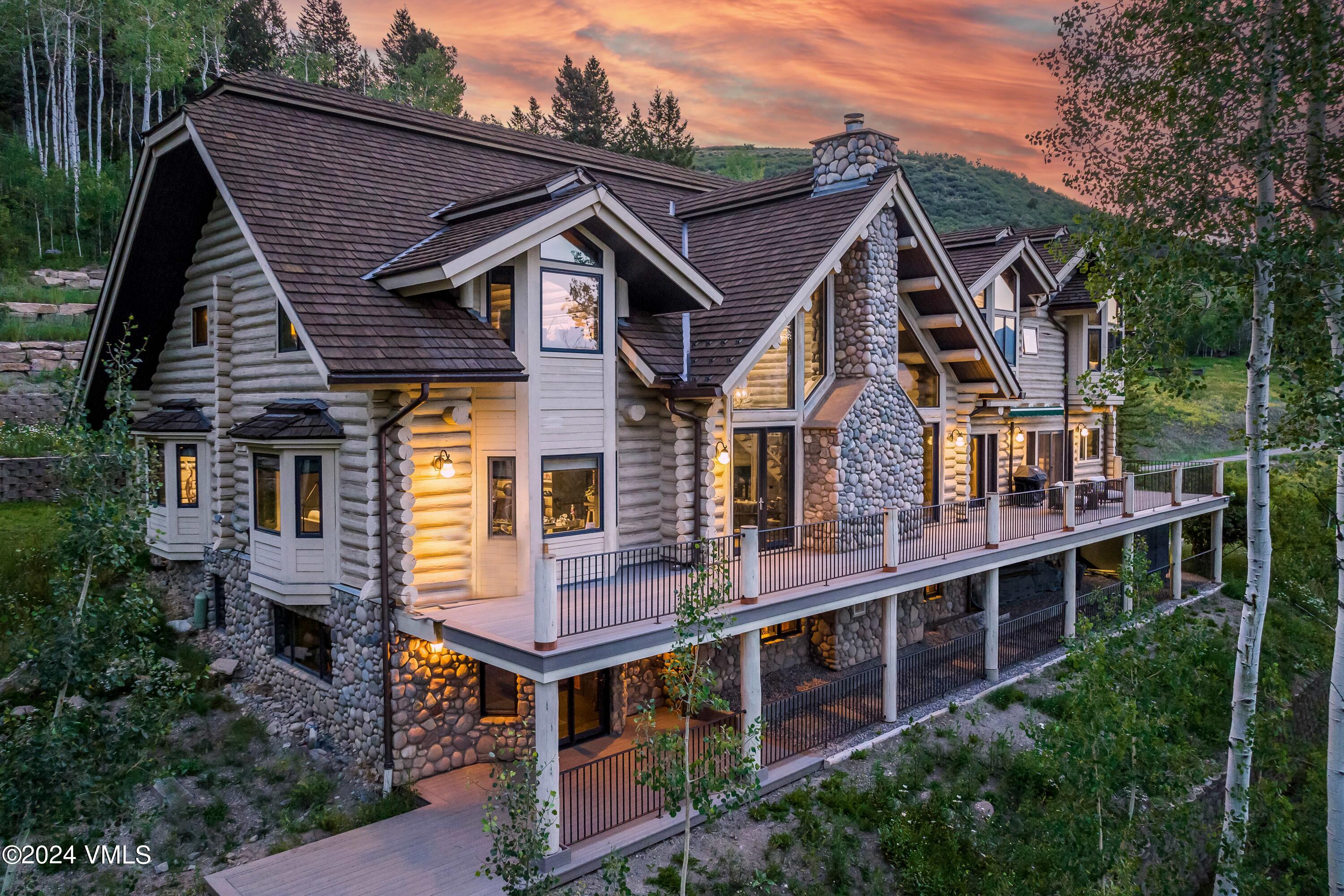 1145 Pilgrim Drive Edwards, CO 81632 - Photo 54 of 54 a front view of house with yard and trees in the background