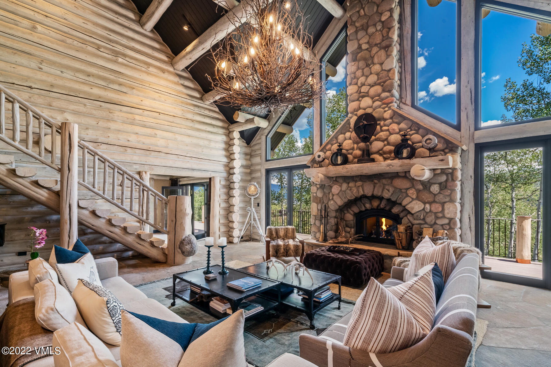 1145 Pilgrim Drive Edwards, CO 81632 - Photo 6 of 54 a view of a patio with couches table and chairs and potted plants