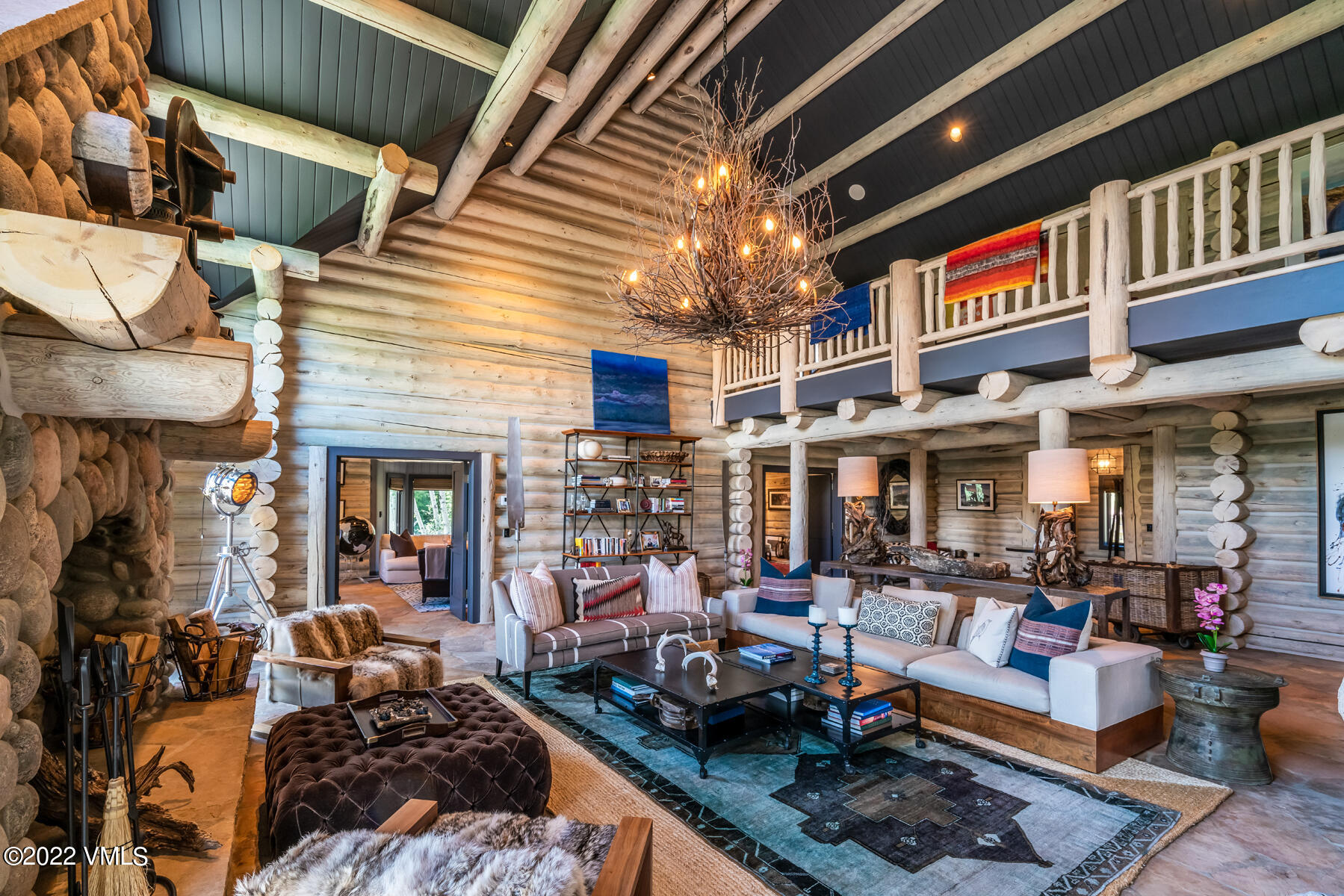 1145 Pilgrim Drive Edwards, CO 81632 - Photo 7 of 54 a outdoor space with lots of furniture and a fireplace