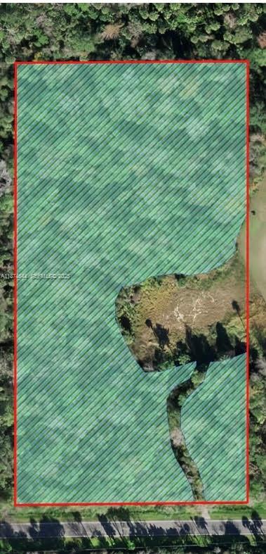 0 Adair Road Davenport, FL 33837 - Photo 1 of 5 a view of a golf course with a garden