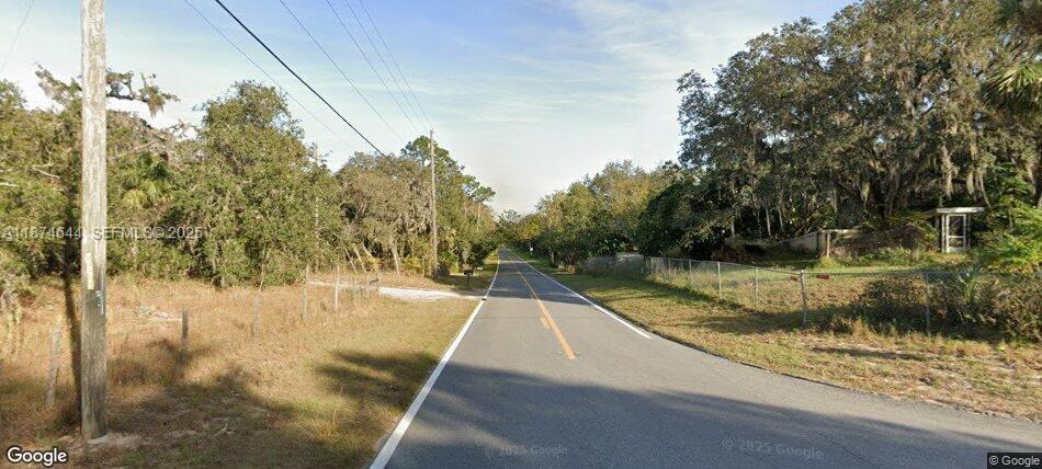 0 Adair Road Davenport, FL 33837 - Photo 4 of 5 a view of a swimming pool with a yard