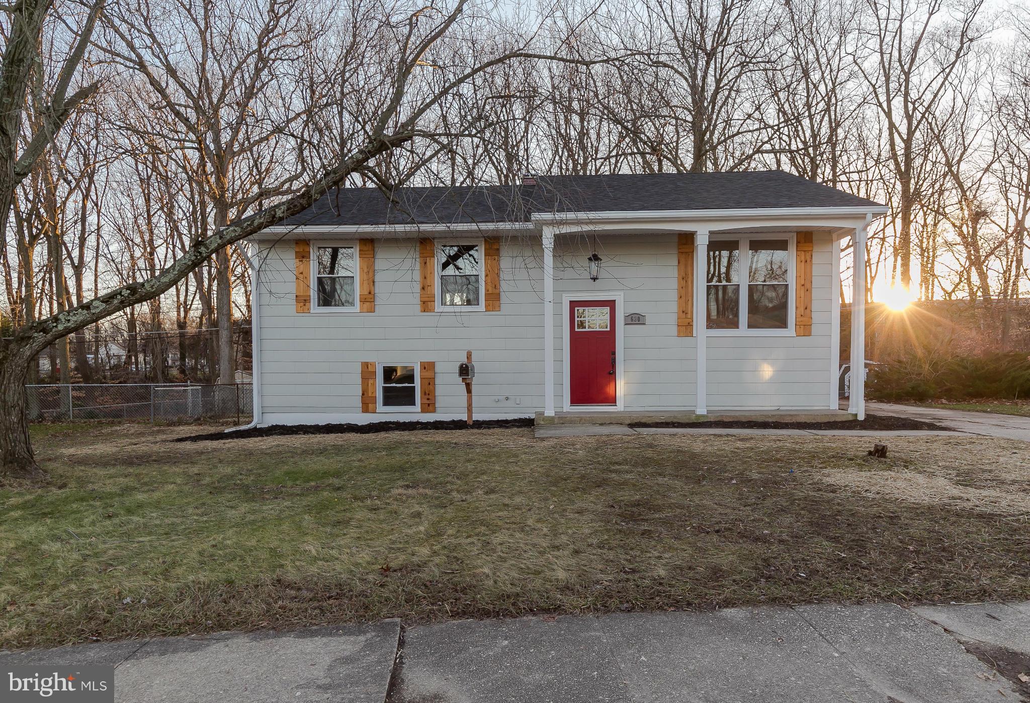 630 Hornbeam Road Edgewood, MD 21040 - Photo 2 of 29 a front view of house with yard and trees in the background