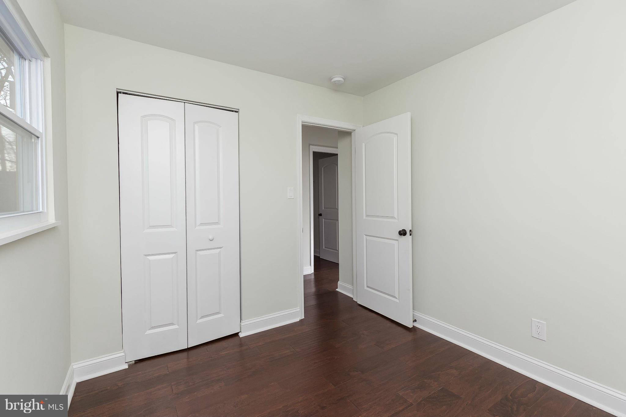 630 Hornbeam Road Edgewood, MD 21040 - Photo 18 of 29 an empty room with wooden floor and windows