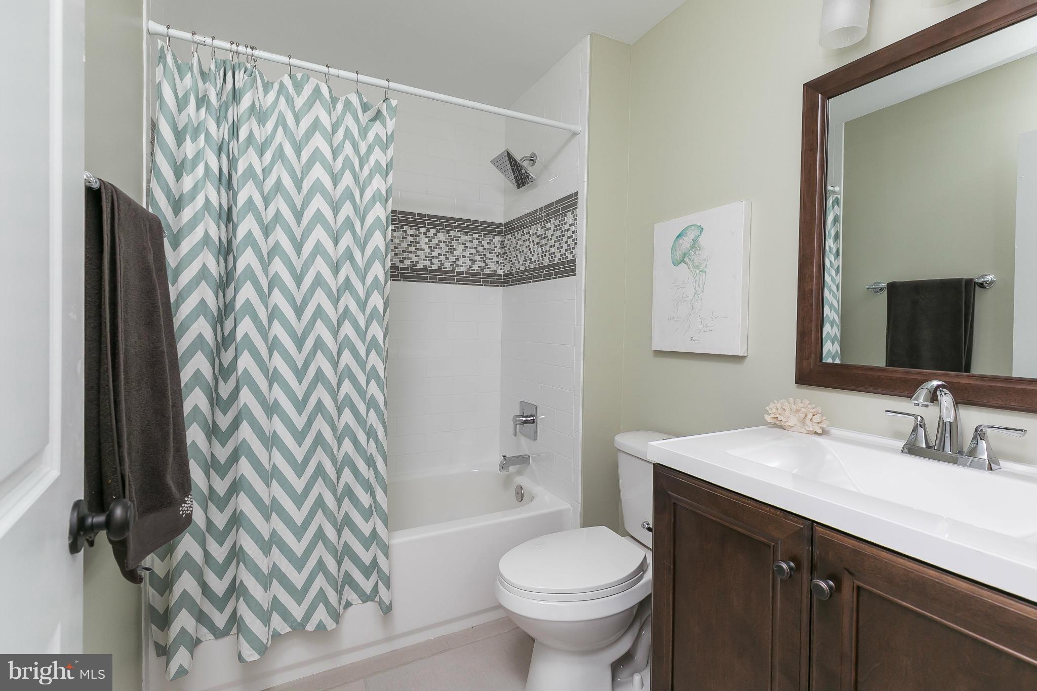 630 Hornbeam Road Edgewood, MD 21040 - Photo 19 of 29 a bathroom with a sink toilet and shower