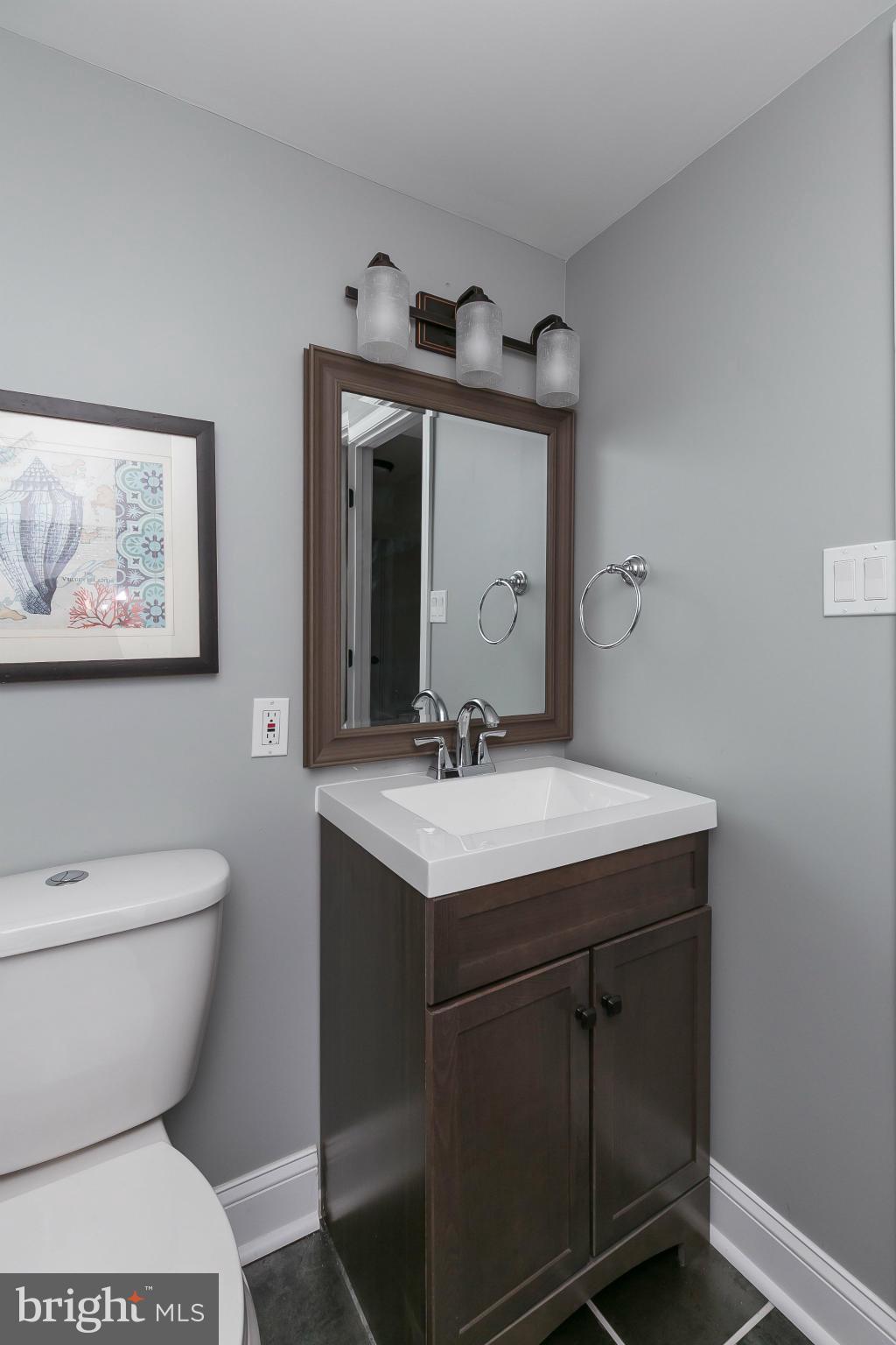 630 Hornbeam Road Edgewood, MD 21040 - Photo 24 of 29 a bathroom with a toilet sink and mirror