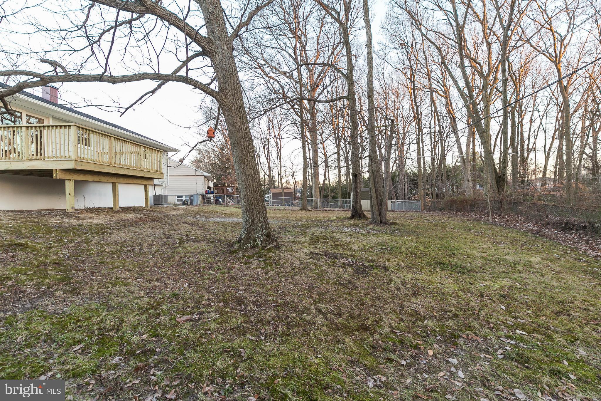 630 Hornbeam Road Edgewood, MD 21040 - Photo 26 of 29 a backyard of apartments with large trees