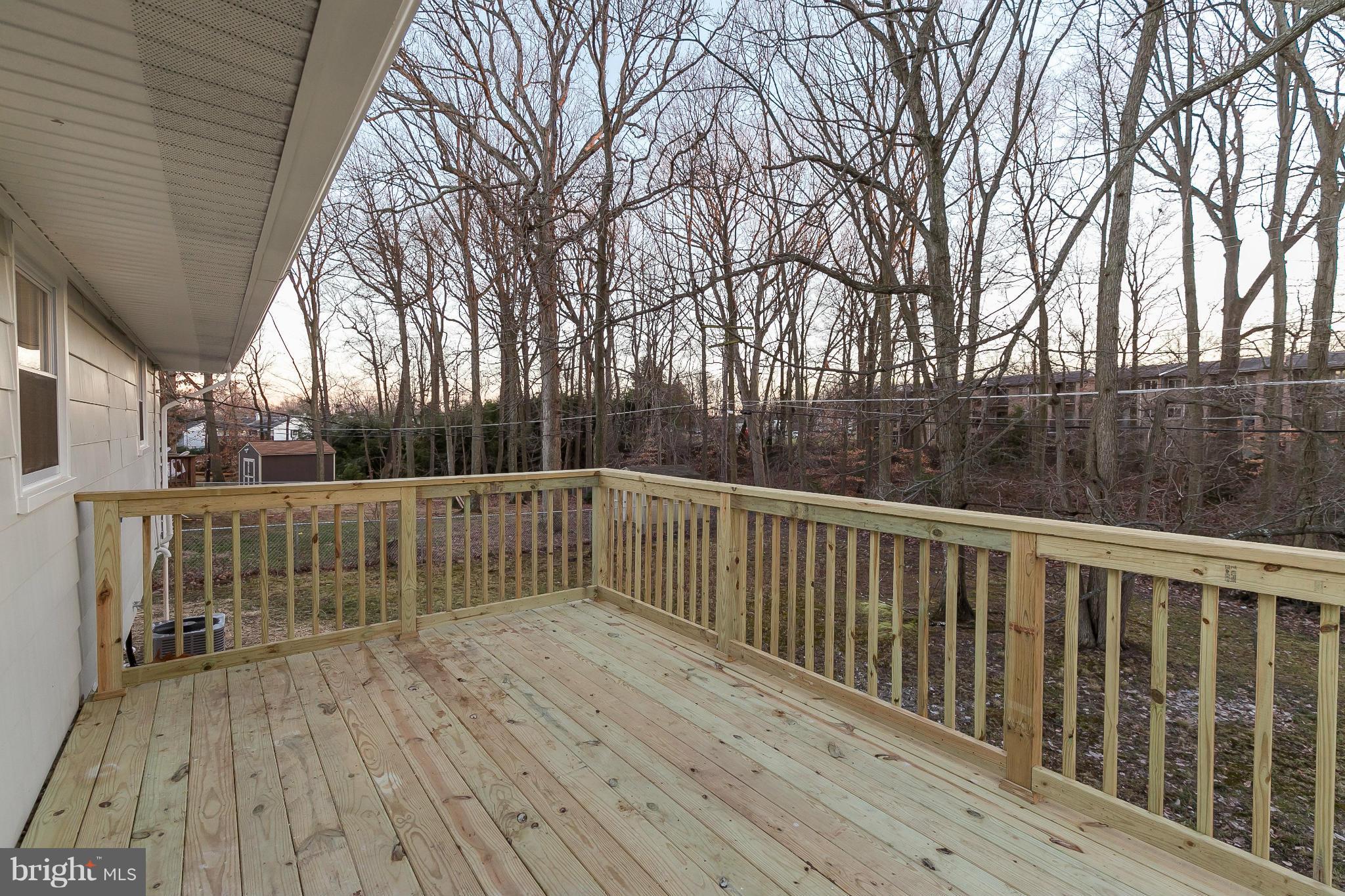 630 Hornbeam Road Edgewood, MD 21040 - Photo 28 of 29 a view of deck with trees and wooden fence