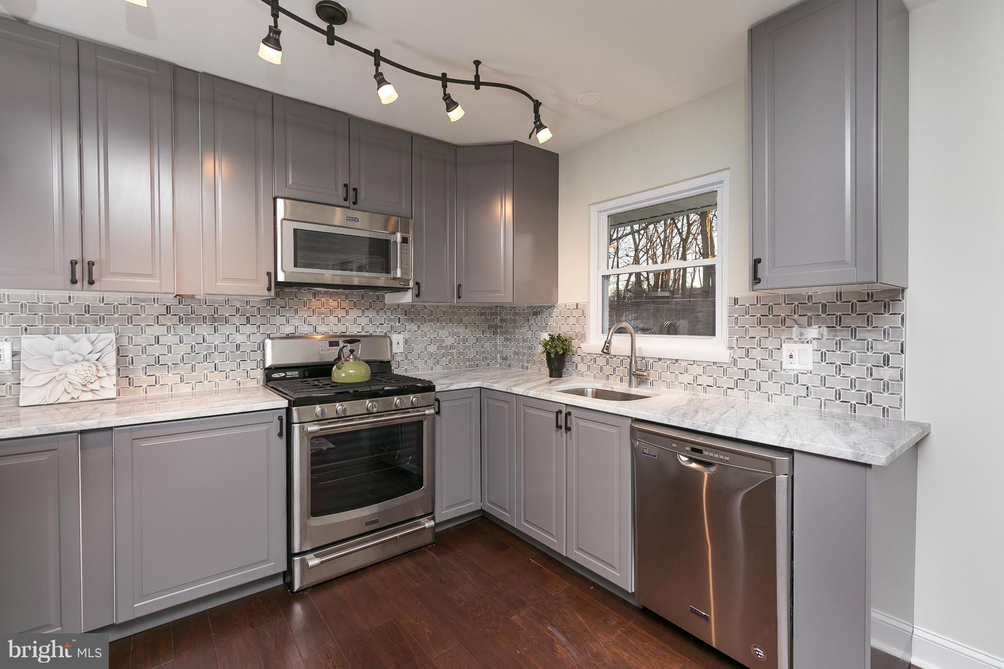 630 Hornbeam Road Edgewood, MD 21040 - Photo 10 of 29 a kitchen with granite countertop cabinets stainless steel appliances and a sink