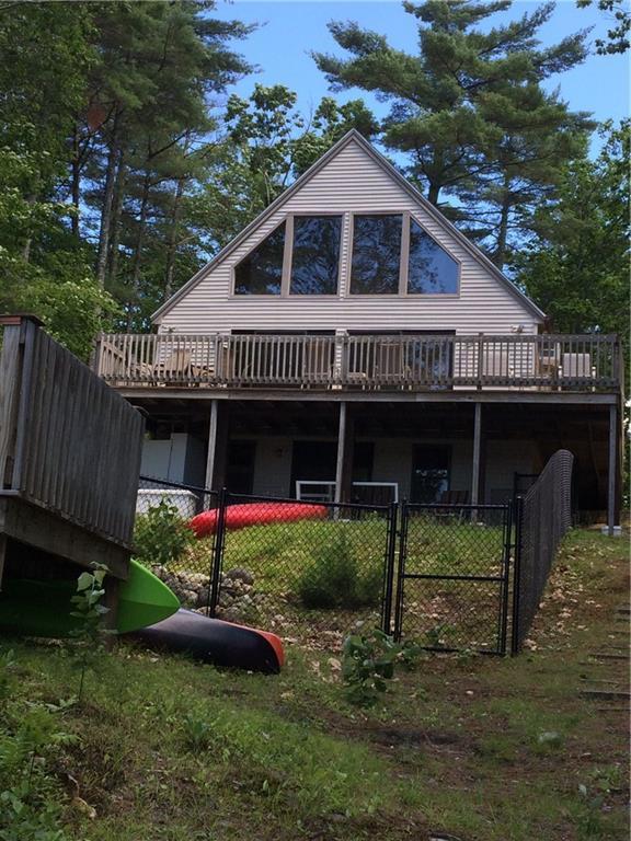 171 Barkers Pond Road Lyman, ME 04002 - Photo 2 of 35 New fenced in yard and patios with...