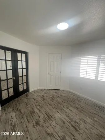 a view of a field with an trees