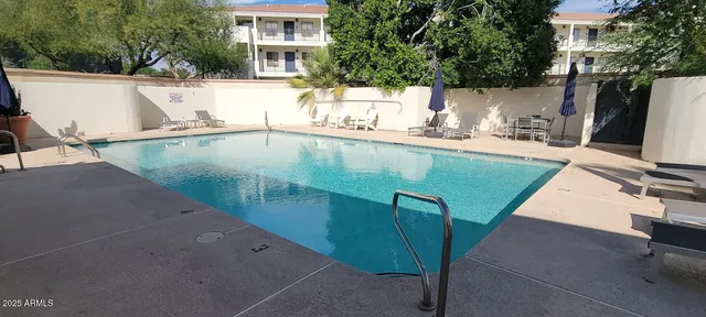 a view of a balcony with ocean view