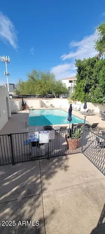 a view of a balcony with ocean view