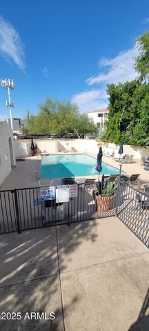 a view of a pathway with a yard