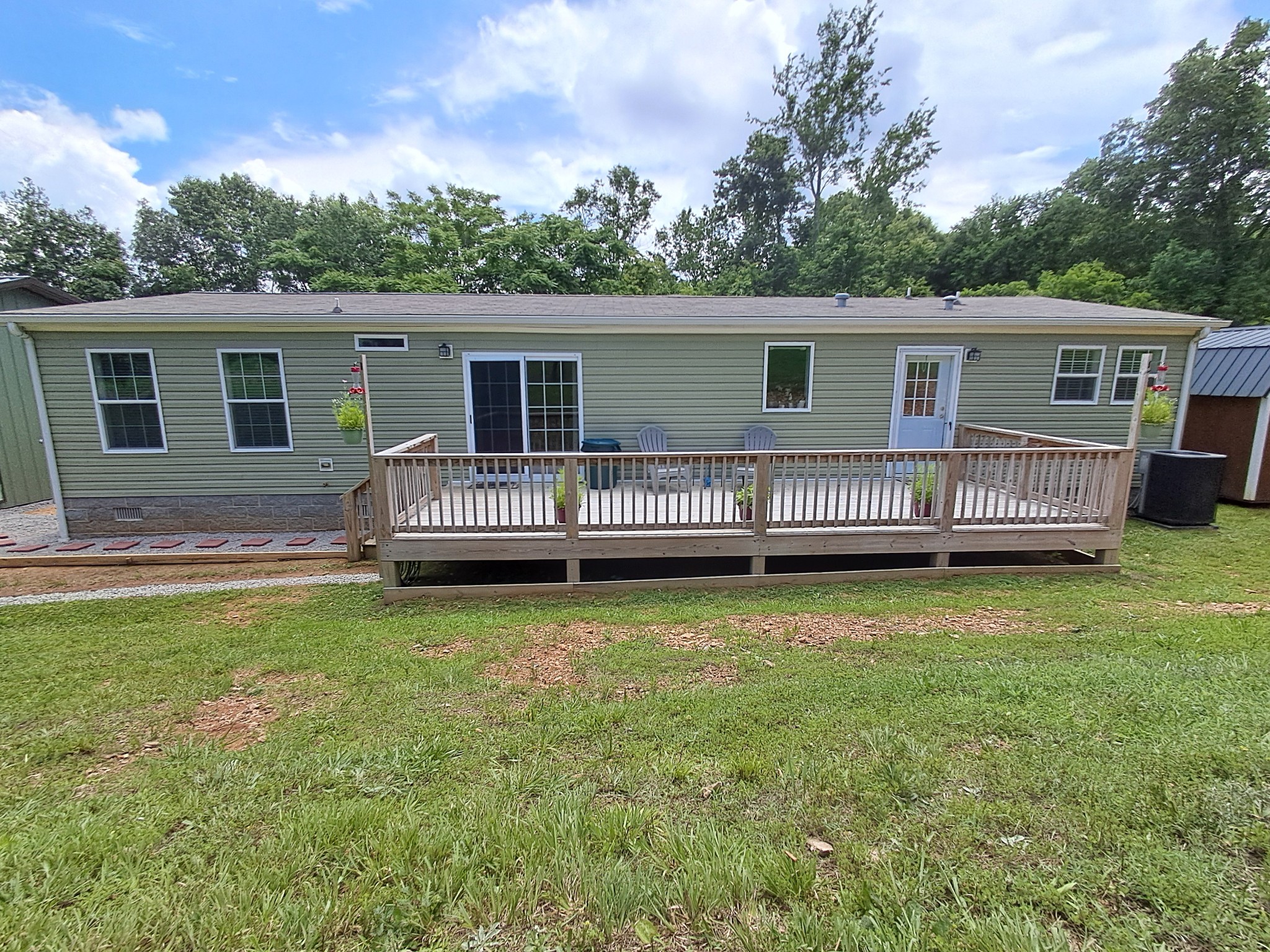 5525 Wiley Hollow Road Culleoka, TN 38451 - Photo 7 of 64 a view of a house with a yard and deck