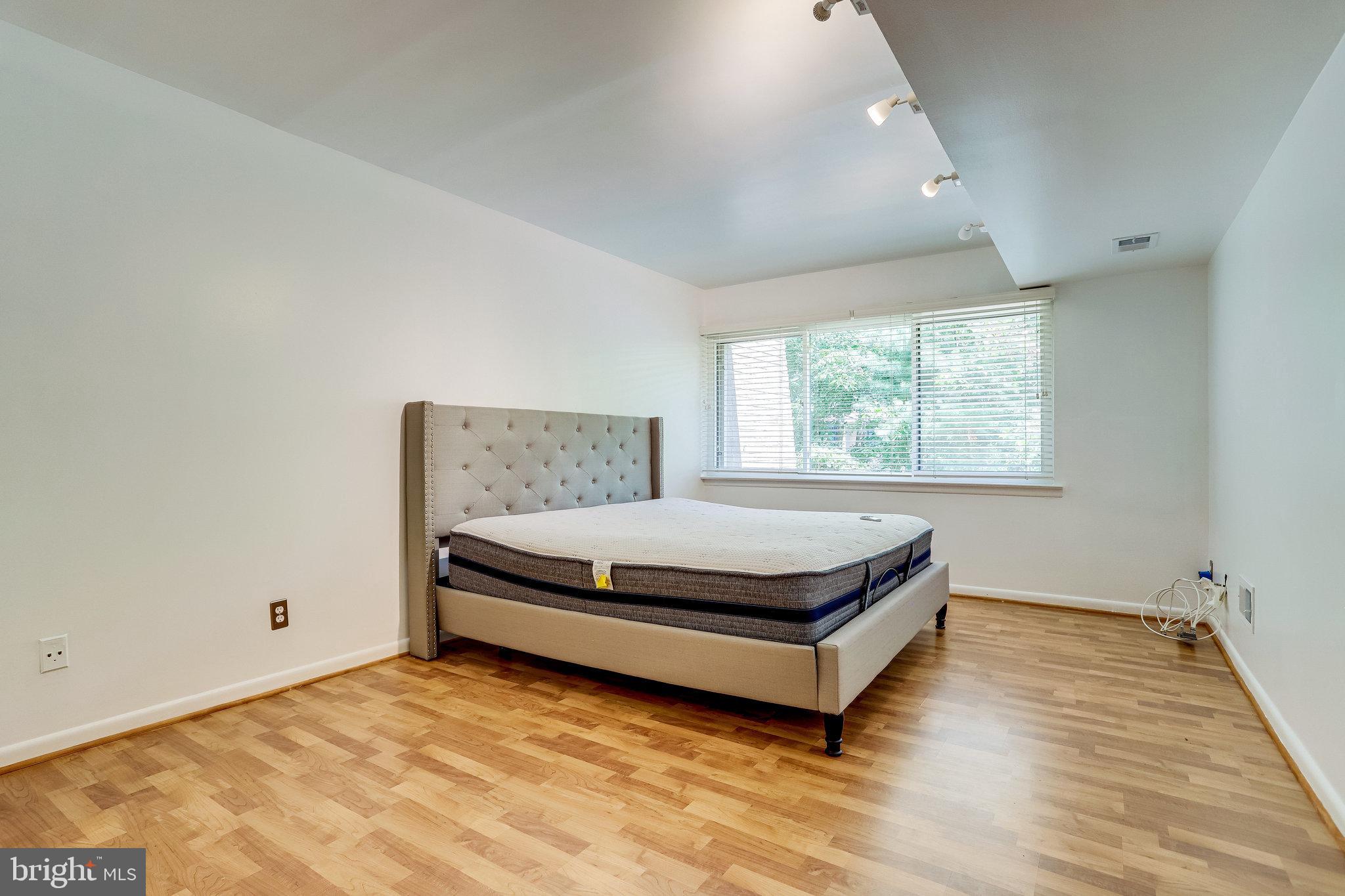 11606 Windbluff Court, Unit 7B Reston, VA 20191 - Photo 14 of 22 Owners Bedroom
