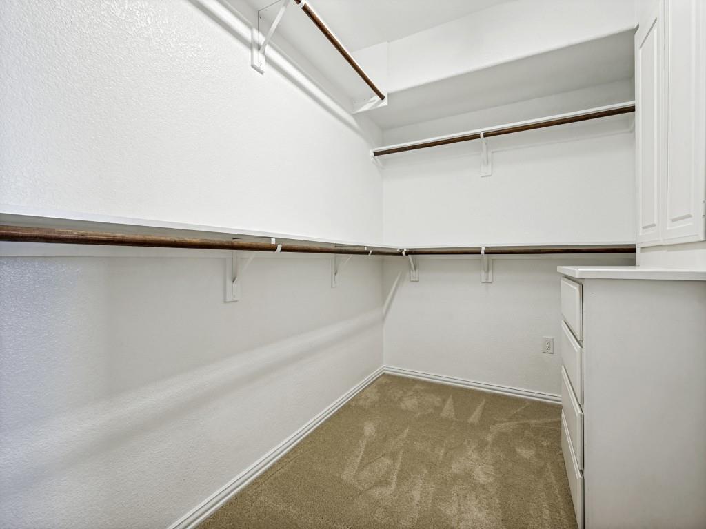 5975 Diamond Spur Frisco, TX 75036 - Photo 21 of 40 a view of a room with racks on the wall