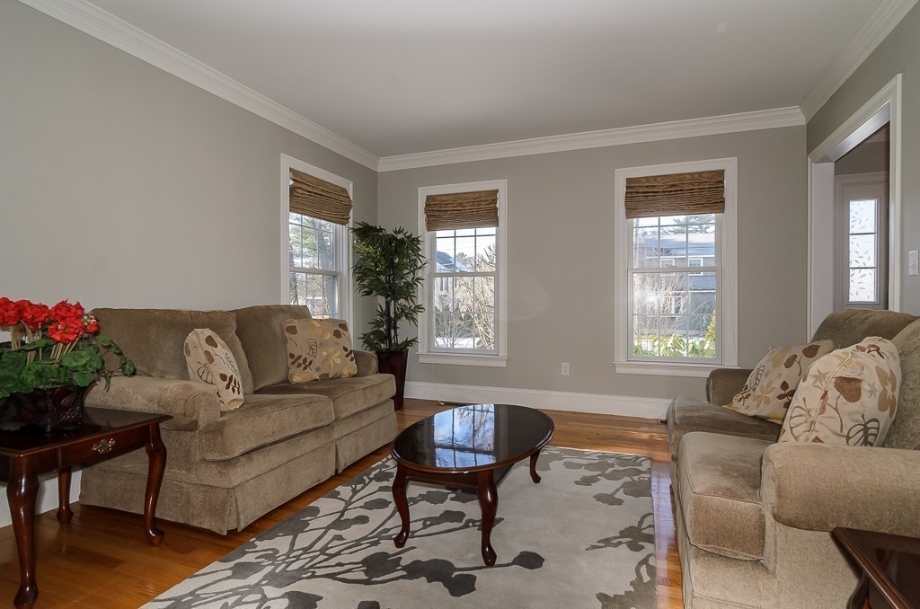 80 Pinewood Road Needham, MA 02492 - Photo 3 of 22 a living room with furniture and a large window