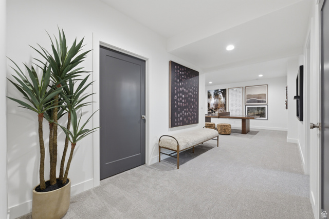 2559 West Aurora Avenue Mapleton, UT 84664 - Photo 44 of 60 Spacious hallway featuring light gray carpeting, recessed lighting, white walls, and a dark gray interior door with white trim
