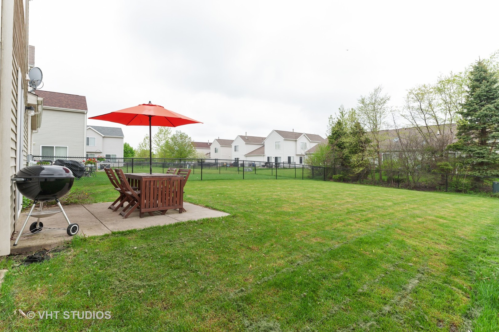 86 Amberly Drive Round Lake, IL 60073 - Photo 12 of 12 a view of a backyard with a patio