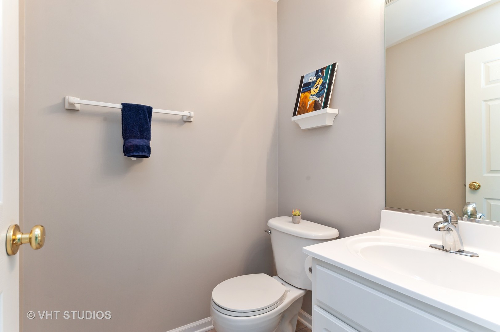 86 Amberly Drive Round Lake, IL 60073 - Photo 10 of 12 a bathroom with a sink a toilet and mirror