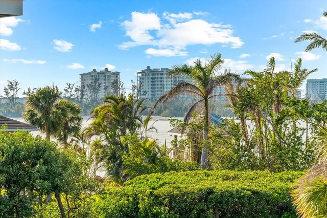 a balcony view with a seating space